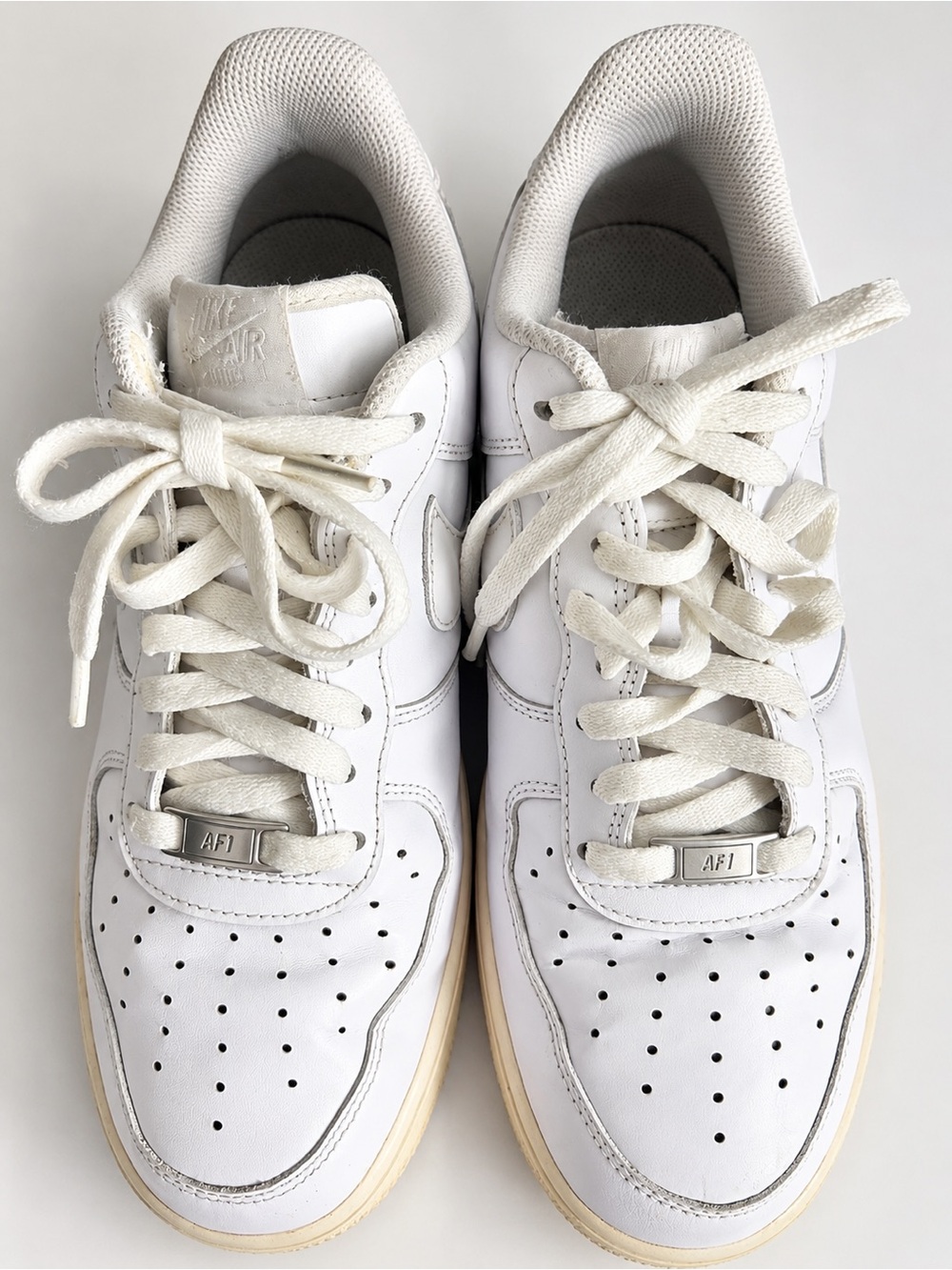 Nike Men’s White Leather Sneakers with Cream Sole
